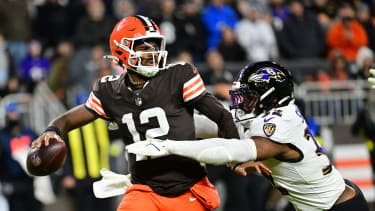Nov 16, 2025; Cleveland, Ohio, USA; Cleveland Browns quarterback Shedeur Sanders (12) is sacked by Baltimore Ravens linebacker Trenton Simpson (32) during the fourth quarter at Huntington Bank Field. Mandatory Credit: Ken Blaze-Imagn Images