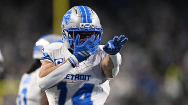 Dec 4, 2025; Detroit, Michigan, USA; Detroit Lions wide receiver Amon-Ra St. Brown (14) celebrates after a play during the first half against the Dallas Cowboys at Ford Field. Mandatory Credit: Lon Horwedel-Imagn Images