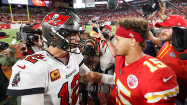Oct 2, 2022; Tampa, Florida, USA;  Tampa Bay Buccaneers quarterback Tom Brady (12) greets Kansas City Chiefs quarterback Patrick Mahomes (15) after a game at Raymond James Stadium. Mandatory Credit: Nathan Ray Seebeck-Imagn Images