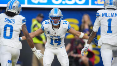 Detroit Lions wide receiver Amon-Ra St. Brown (14) celebrate after a touchdown
