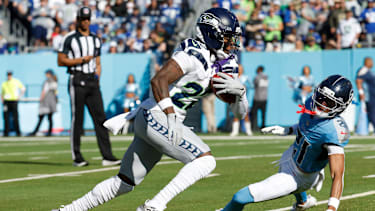 NASHVILLE, TN - NOVEMBER 23: Seattle Seahawks wide receiver Rashid Shaheed (22) returns a kick past Tennessee Titans cornerback Micah Robinson (21) during a game between the Tennessee Titans and Seattle Seahawks, November 23, 2025, at Nissan Stadium in Nashville, Tennessee. (Photo by Matthew Maxey Icon Sportswire) NFL, American Football Herren, USA NOV 23 Seahawks at Titans EDITORIAL USE ONLY Icon251123112