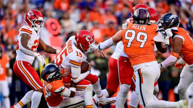 DENVER, CO - NOVEMBER 16: Kansas City Chiefs quarterback Patrick Mahomes (15) is sacked by Denver Broncos cornerback Ja'Quan McMillian (29) in the second quarter during a game between the Kansas City Chiefs and the Denver Broncos at Empower Field at Mile High on November 16, 2025 in Denver, Colorado. (Photo by Dustin Bradford/Icon Sportswire via Getty Images)